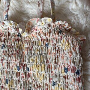 Girls "retro" floral swimsuit. Ruffled Skirt and Shirring on top. Bows on sleeve